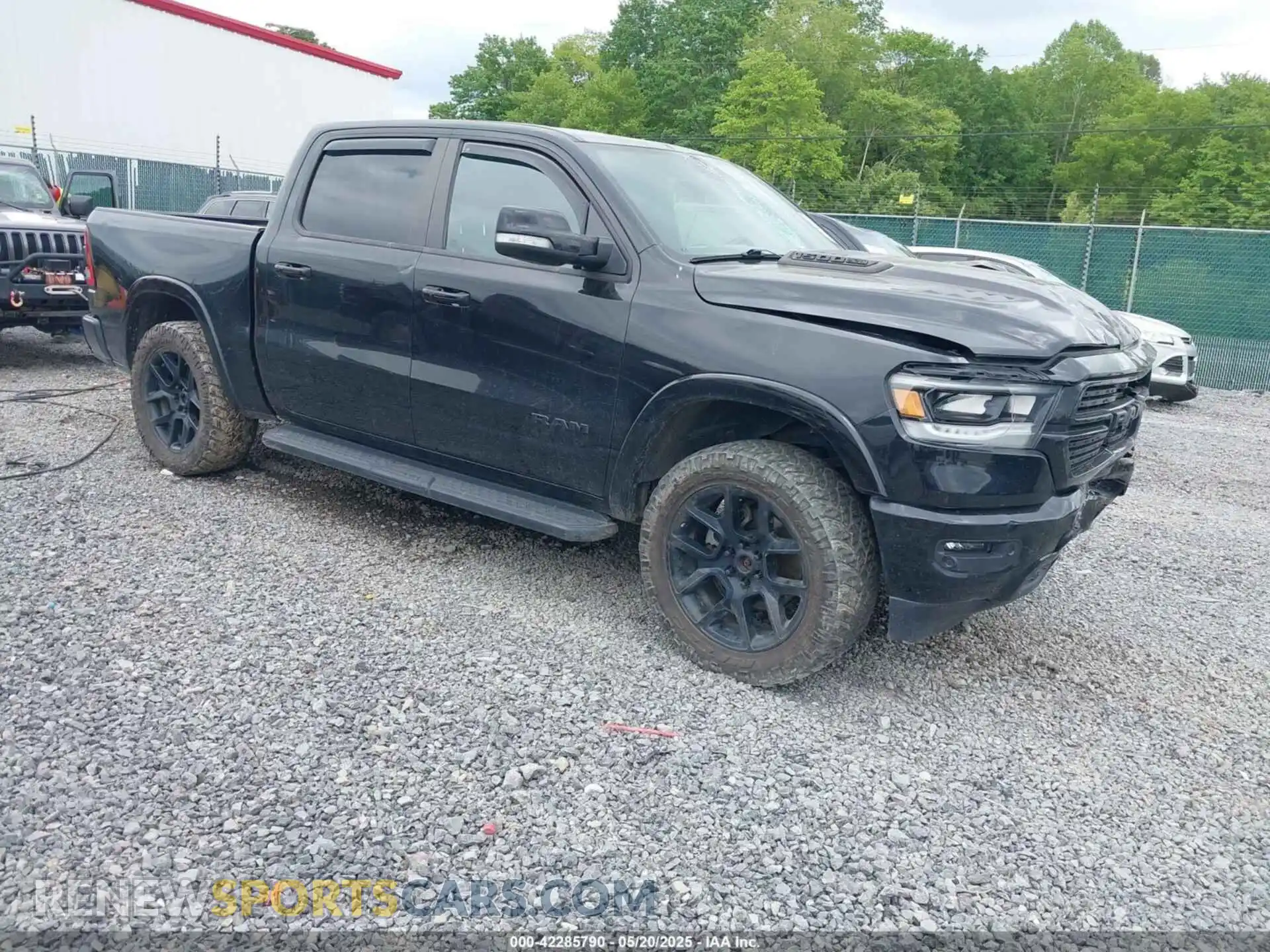 1 Photograph of a damaged car 1C6SRFJT5MN732344 RAM 1500 2021