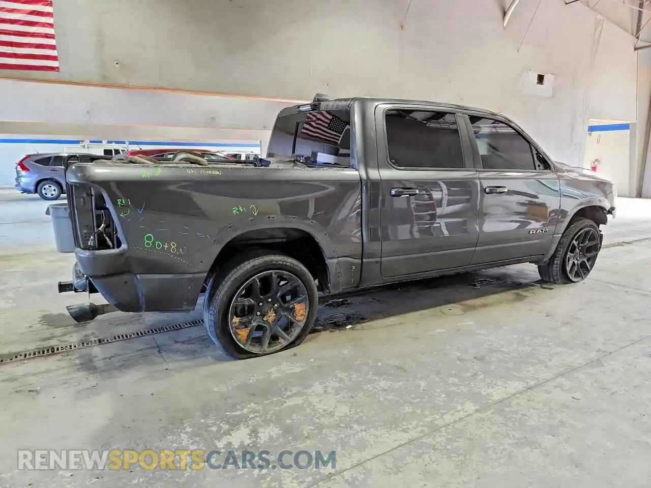 3 Photograph of a damaged car 1C6SRFJT6MN559515 RAM 1500 2021