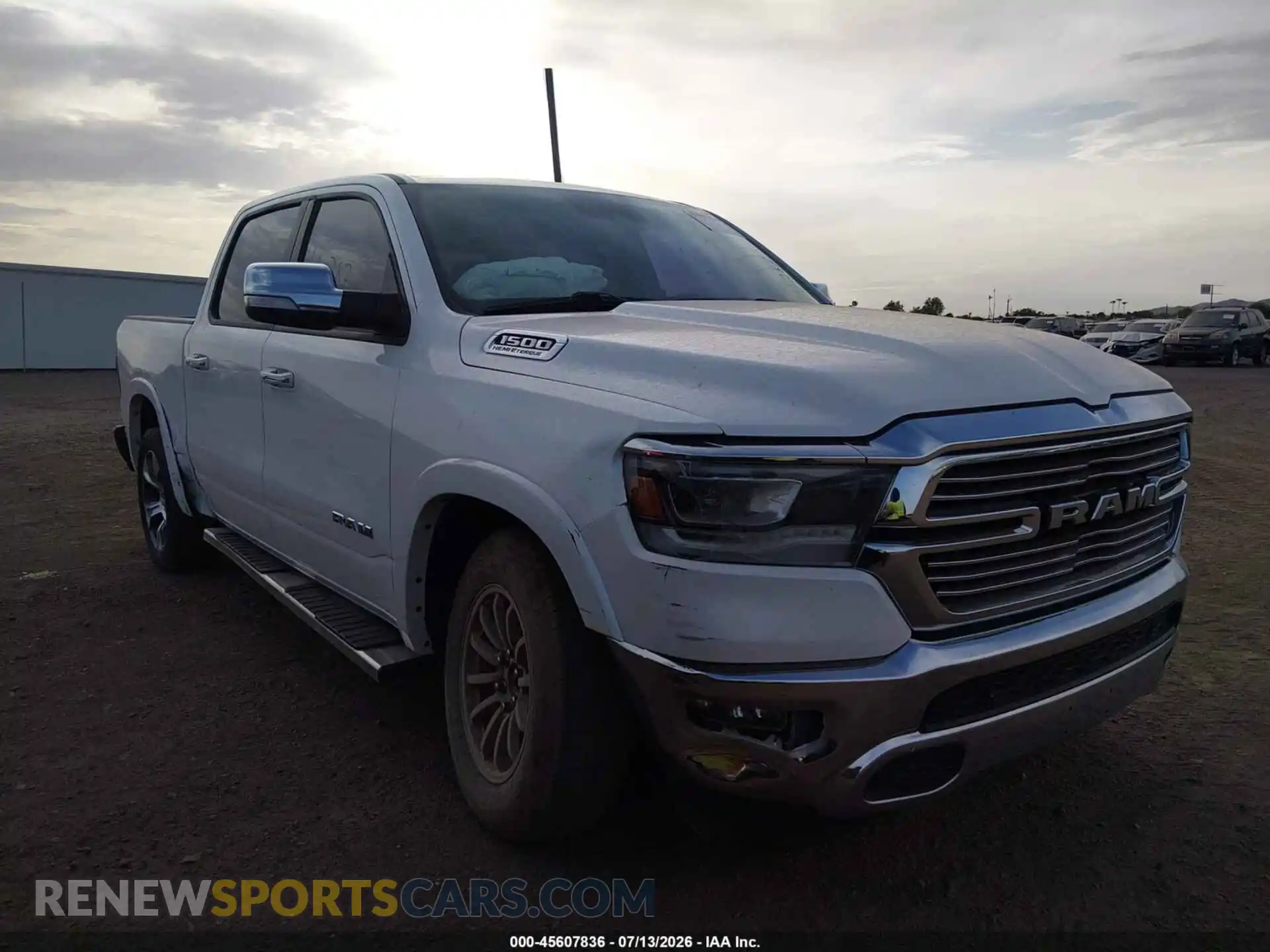 1 Photograph of a damaged car 1C6SRFJT6MN802983 RAM 1500 2021