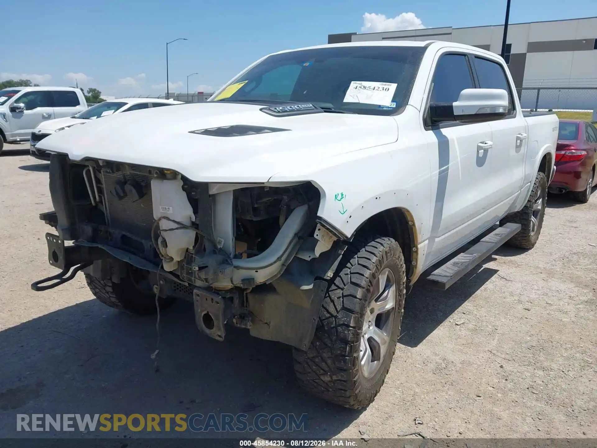 2 Photograph of a damaged car 1C6SRFJT7MN737142 RAM 1500 2021