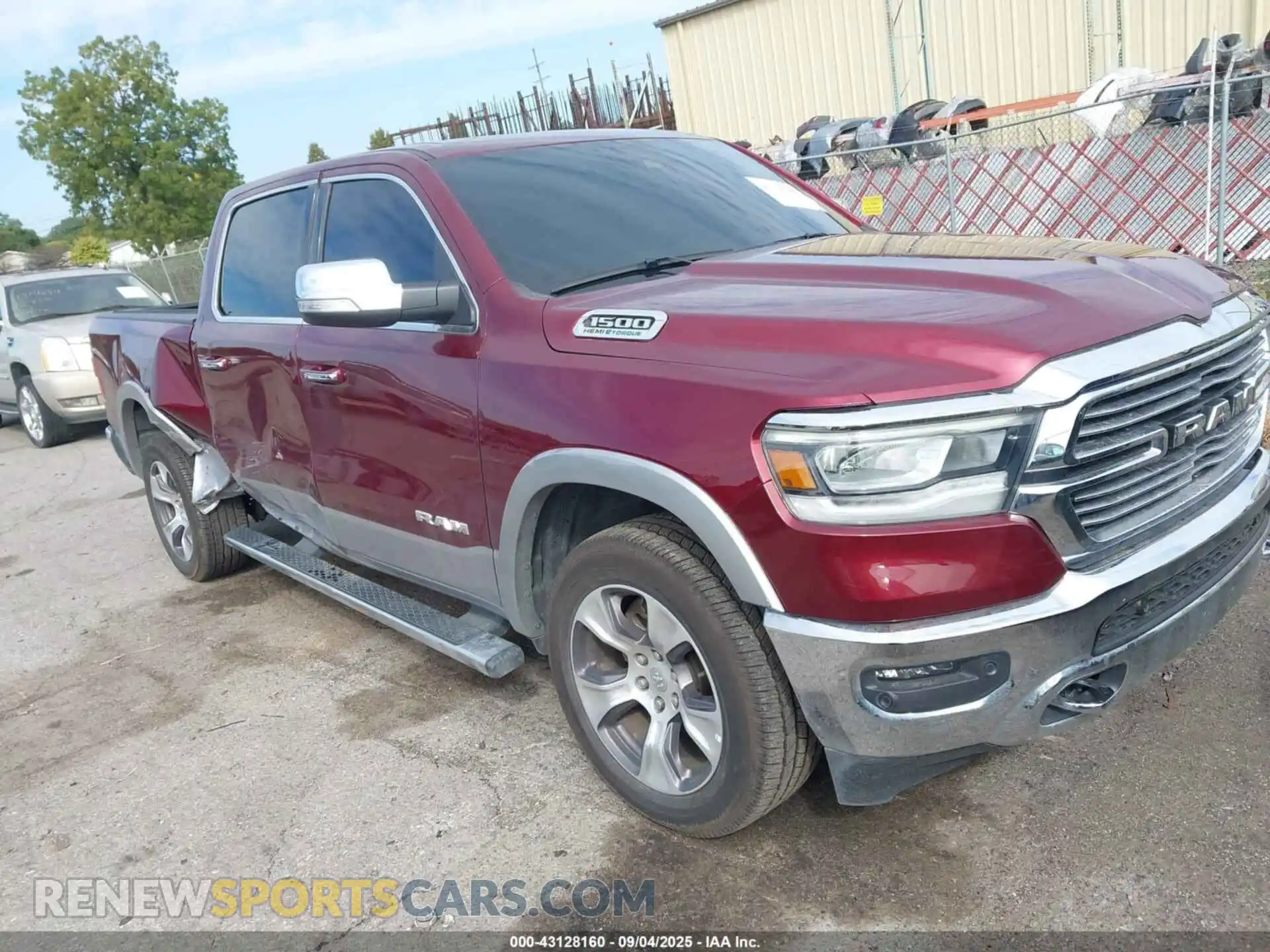 1 Photograph of a damaged car 1C6SRFJT7MN774479 RAM 1500 2021