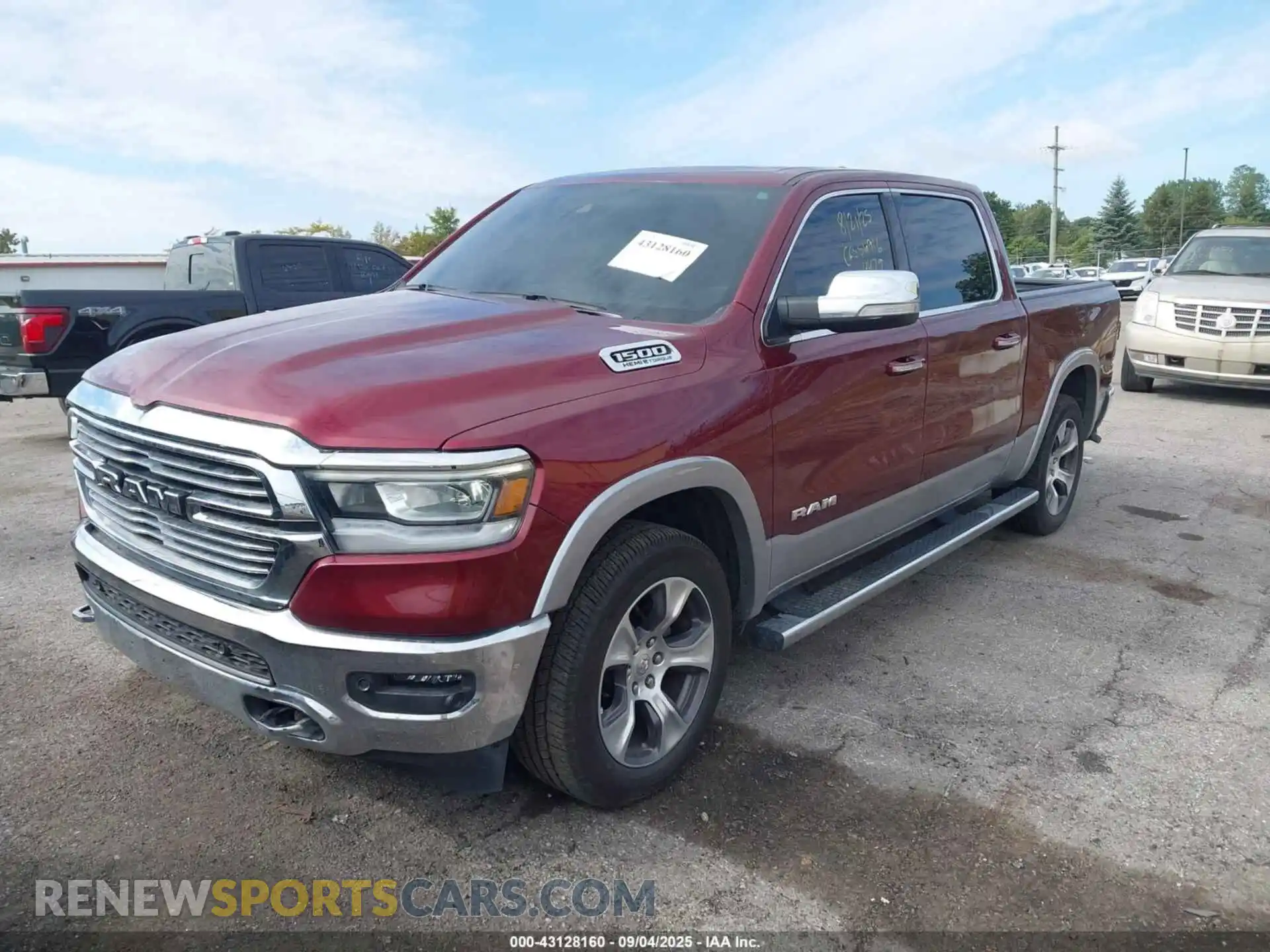 2 Photograph of a damaged car 1C6SRFJT7MN774479 RAM 1500 2021