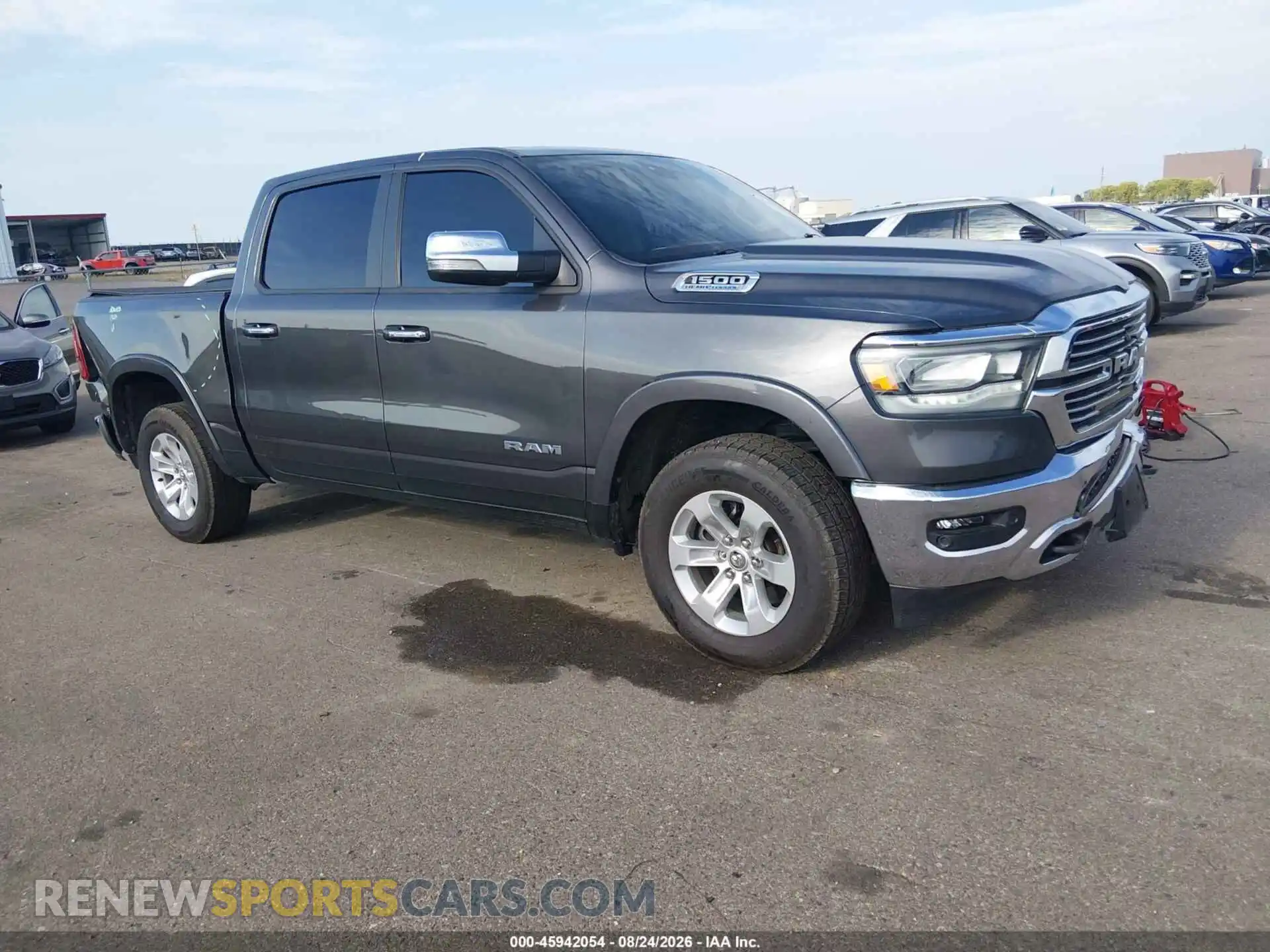1 Photograph of a damaged car 1C6SRFJT7MN789225 RAM 1500 2021
