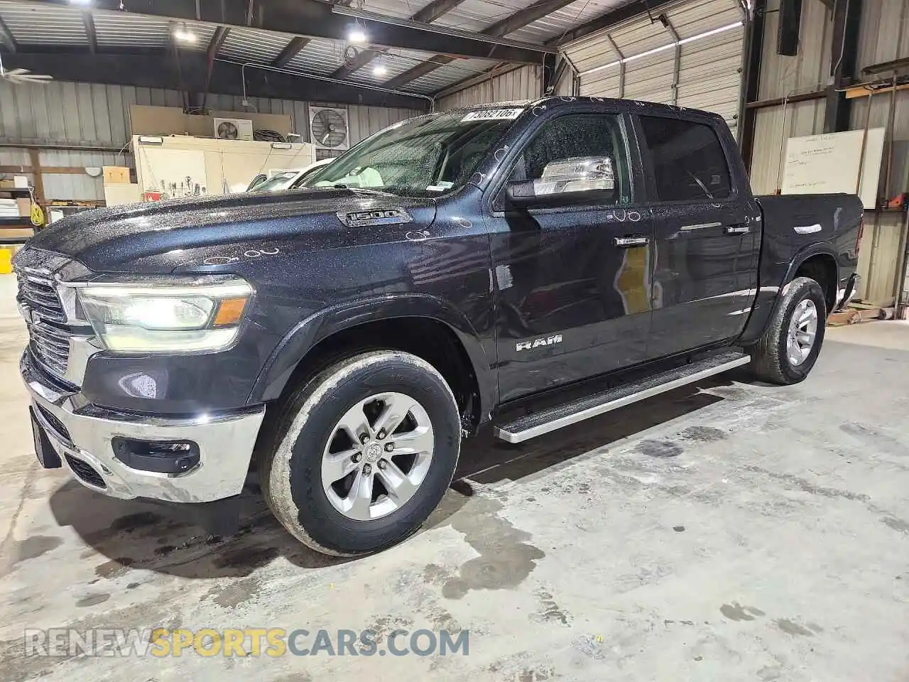 1 Photograph of a damaged car 1C6SRFJT7MN793713 RAM 1500 2021