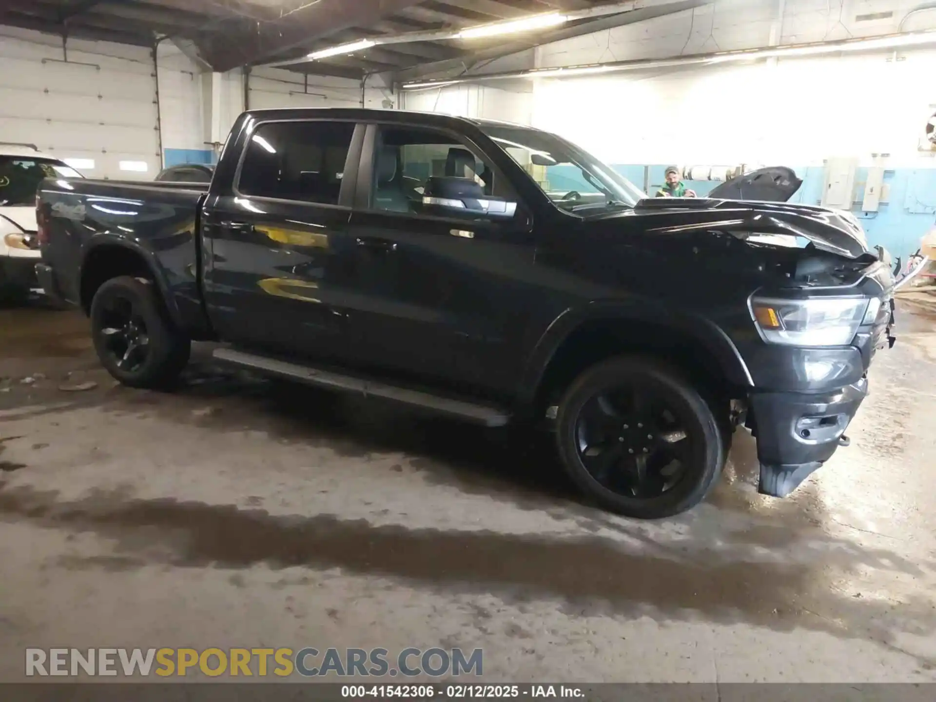 1 Photograph of a damaged car 1C6SRFJT8MN515628 RAM 1500 2021