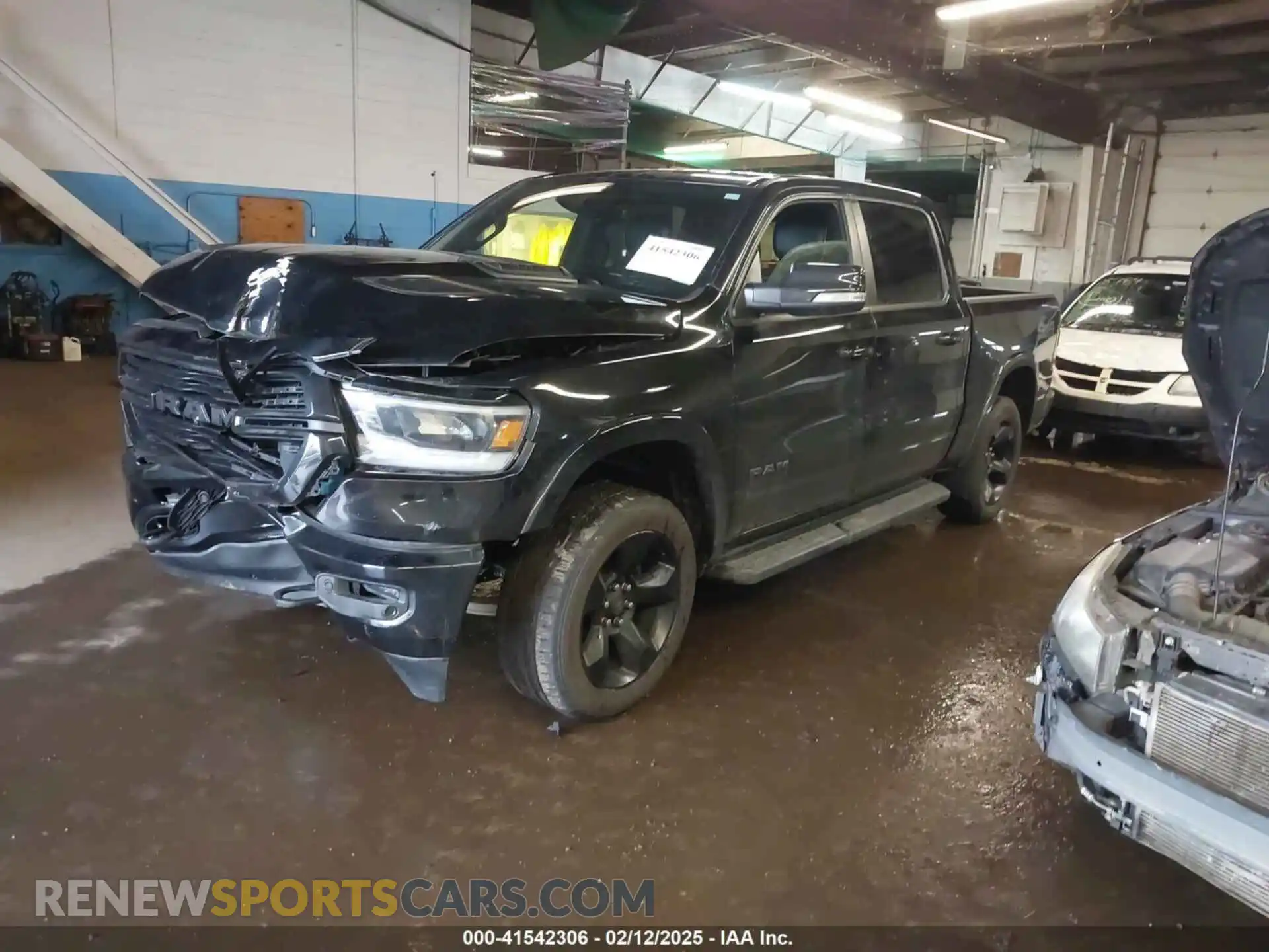 2 Photograph of a damaged car 1C6SRFJT8MN515628 RAM 1500 2021