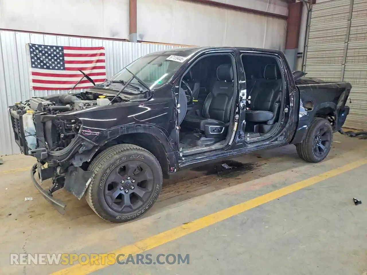 1 Photograph of a damaged car 1C6SRFJT8MN536267 RAM 1500 2021