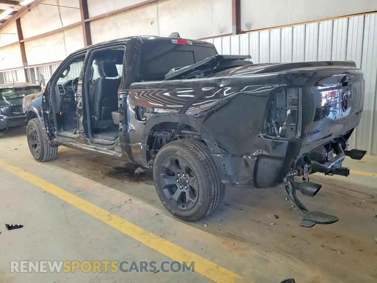 2 Photograph of a damaged car 1C6SRFJT8MN536267 RAM 1500 2021