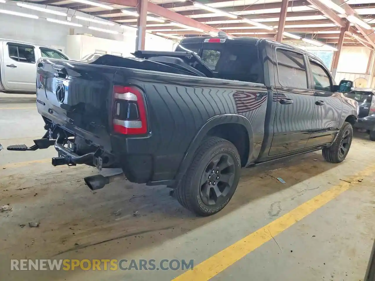 3 Photograph of a damaged car 1C6SRFJT8MN536267 RAM 1500 2021