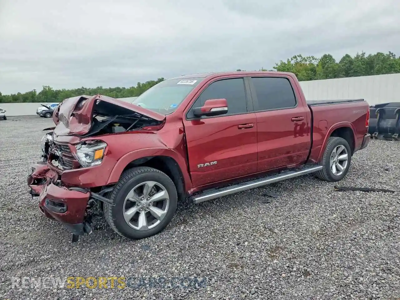 1 Photograph of a damaged car 1C6SRFJT8MN718650 RAM 1500 2021