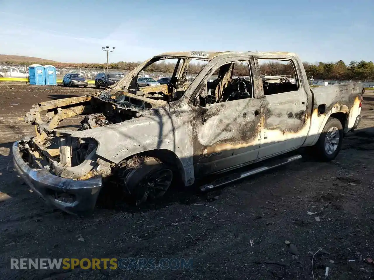 1 Photograph of a damaged car 1C6SRFJT8MN731754 RAM 1500 2021