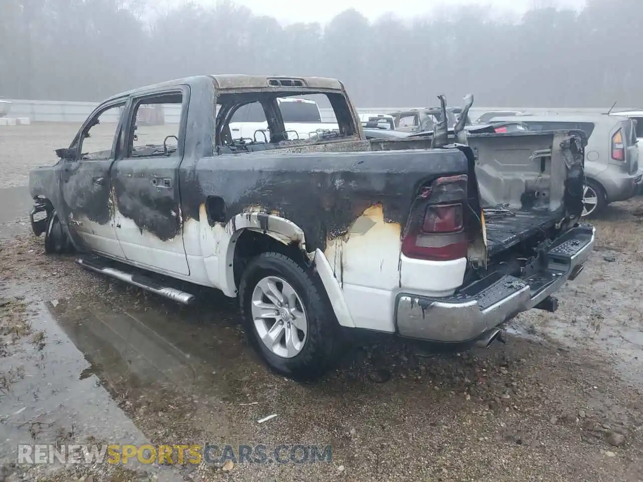 2 Photograph of a damaged car 1C6SRFJT8MN731754 RAM 1500 2021
