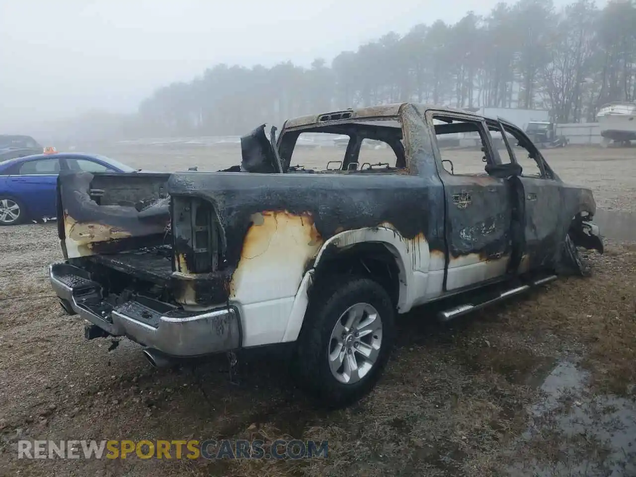 3 Photograph of a damaged car 1C6SRFJT8MN731754 RAM 1500 2021