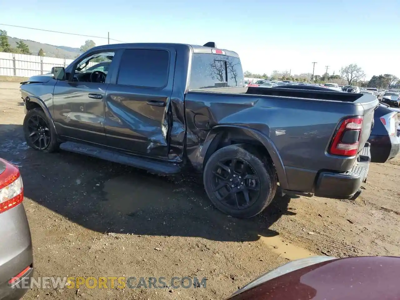 2 Photograph of a damaged car 1C6SRFJT8MN739062 RAM 1500 2021
