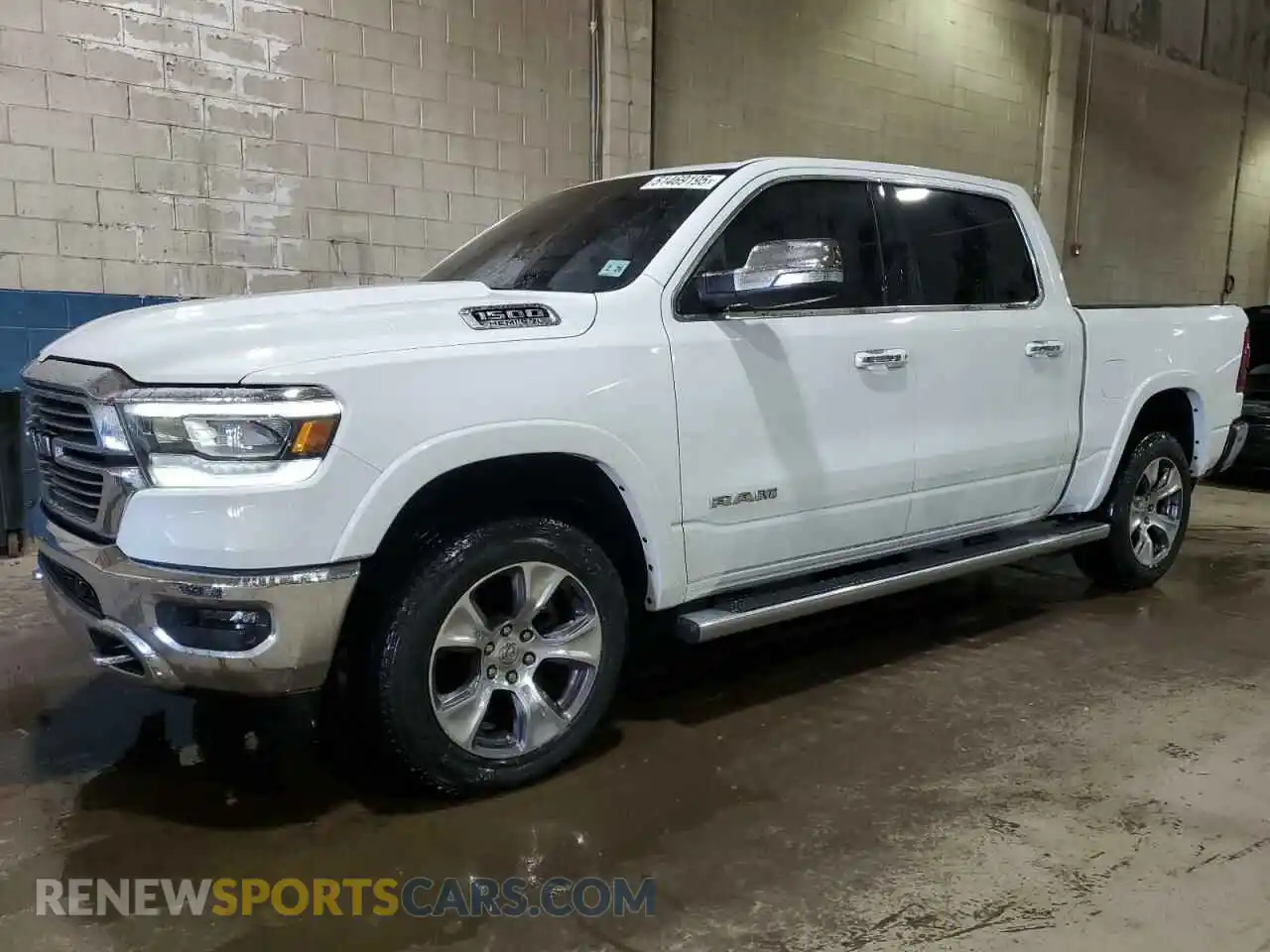 1 Photograph of a damaged car 1C6SRFJTXMN557055 RAM 1500 2021