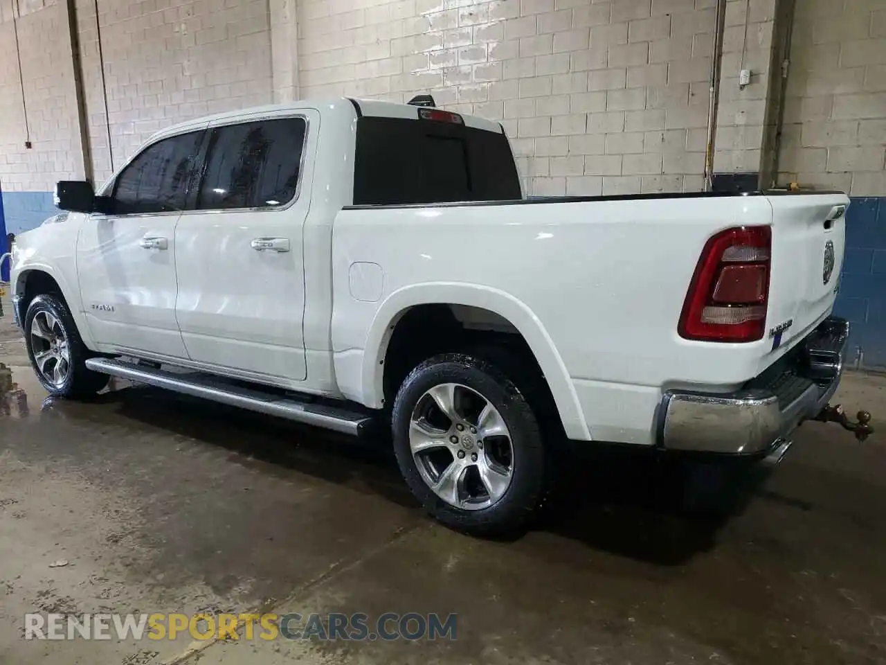 2 Photograph of a damaged car 1C6SRFJTXMN557055 RAM 1500 2021