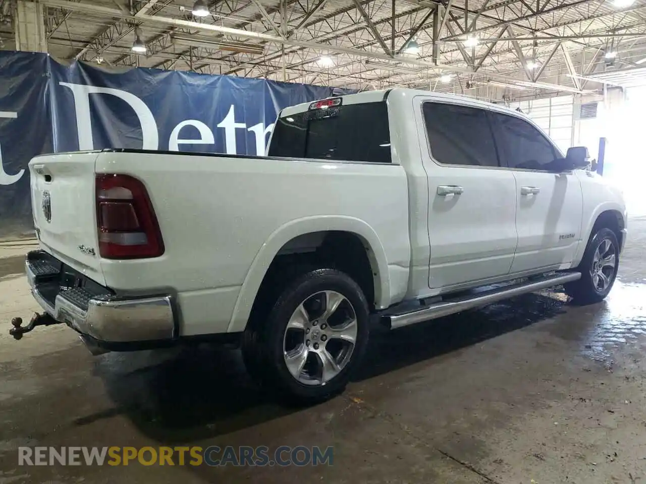 3 Photograph of a damaged car 1C6SRFJTXMN557055 RAM 1500 2021
