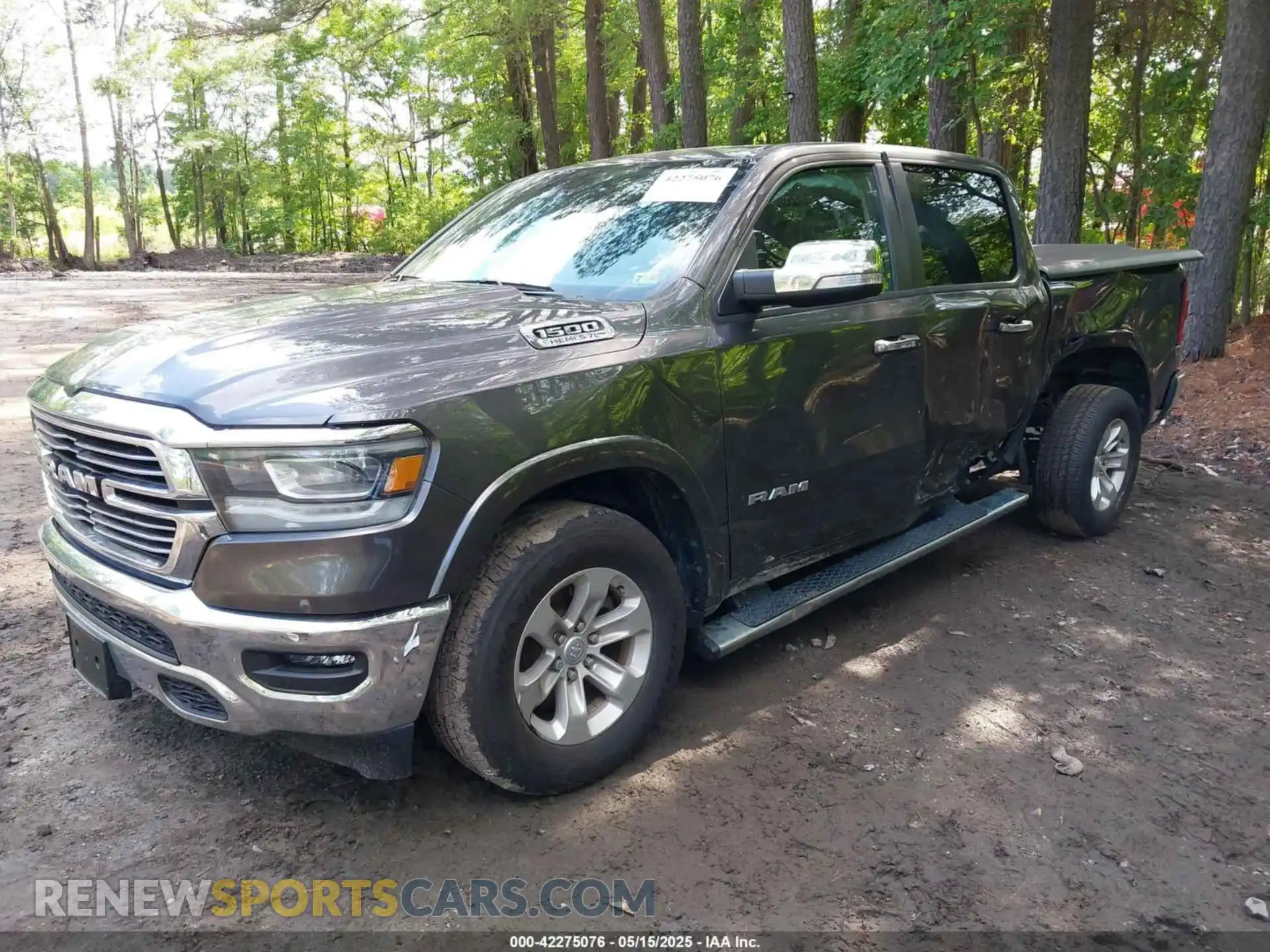 2 Photograph of a damaged car 1C6SRFJTXMN734090 RAM 1500 2021