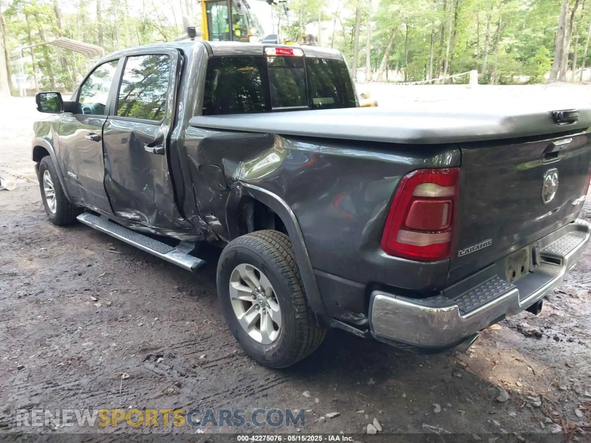 3 Photograph of a damaged car 1C6SRFJTXMN734090 RAM 1500 2021