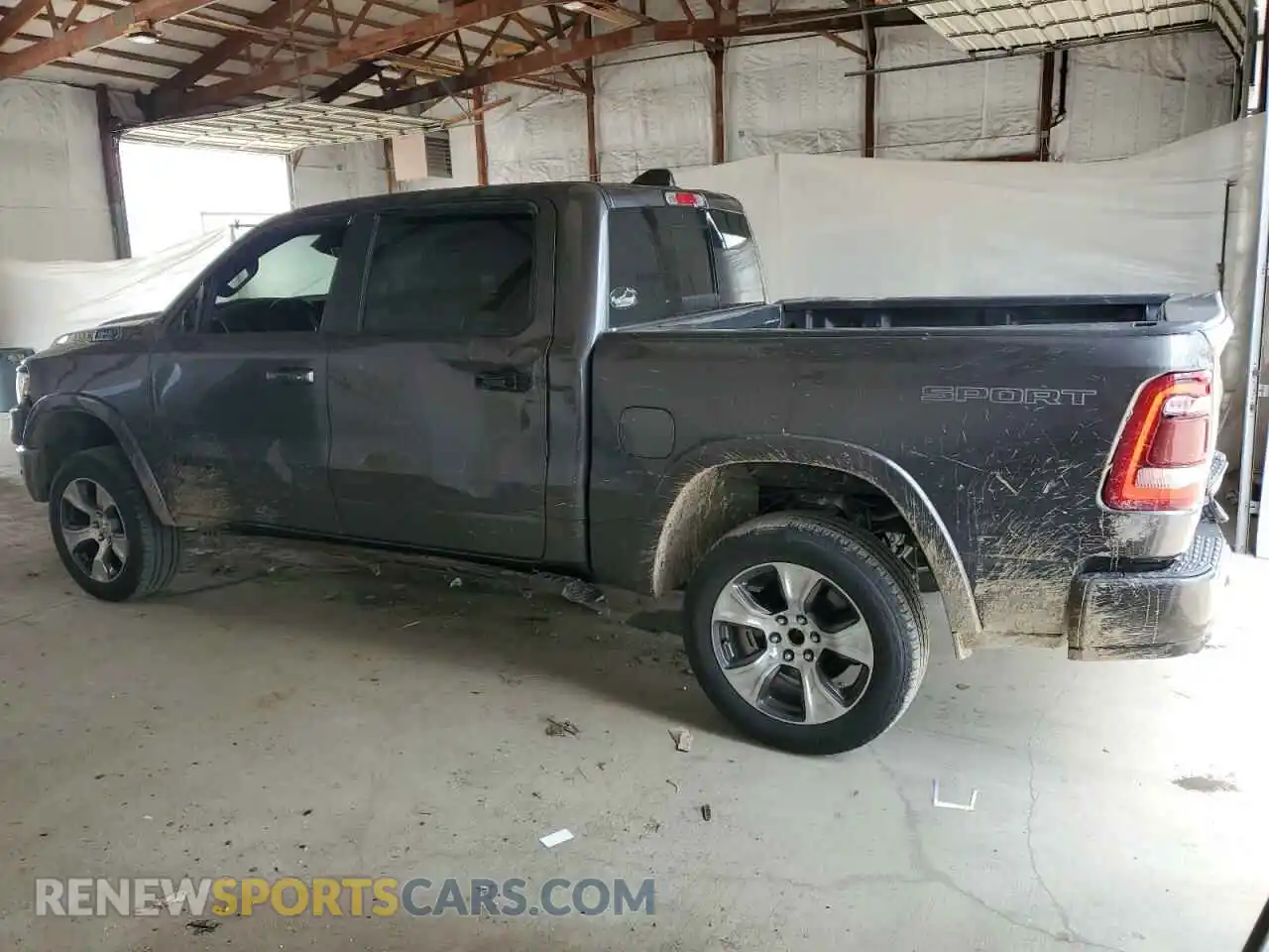 2 Photograph of a damaged car 1C6SRFJTXMN781488 RAM 1500 2021