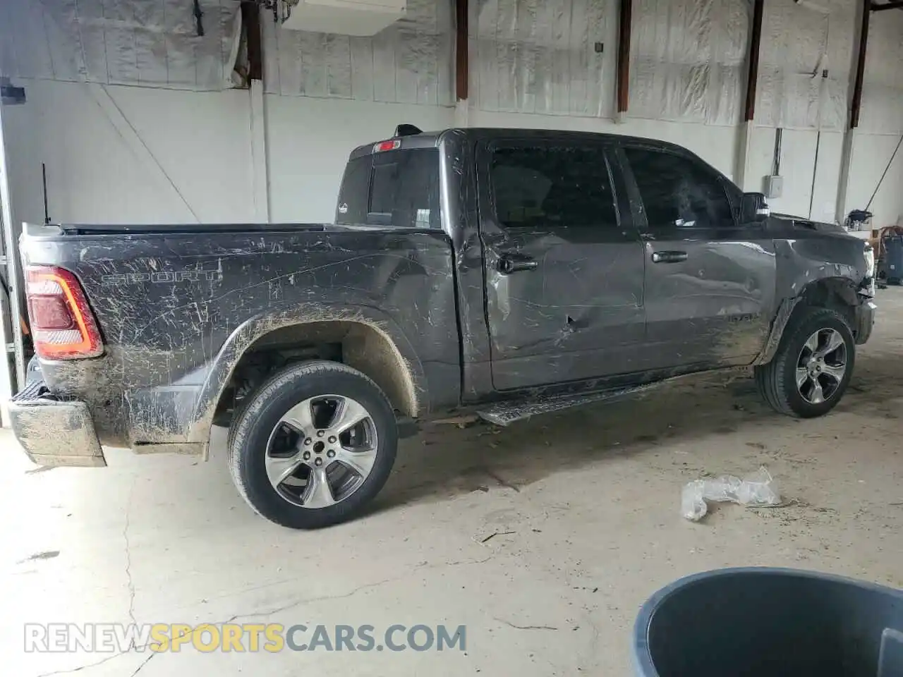 3 Photograph of a damaged car 1C6SRFJTXMN781488 RAM 1500 2021