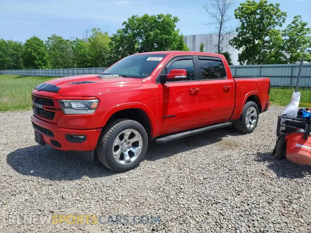 1 Photograph of a damaged car 1C6SRFJTXMN789252 RAM 1500 2021