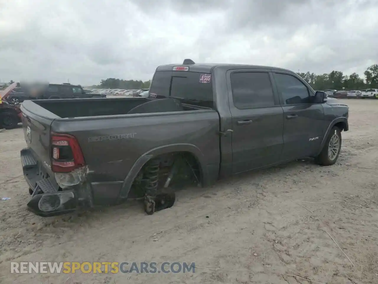 3 Photograph of a damaged car 1C6SRFJTXMN799294 RAM 1500 2021