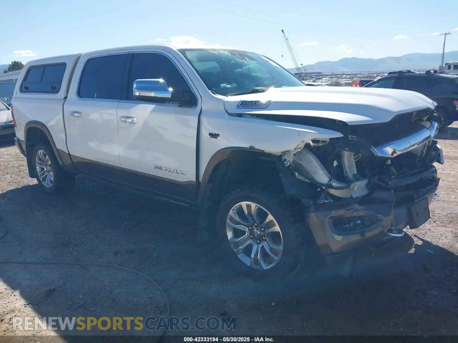 1 Photograph of a damaged car 1C6SRFKM7MN748441 RAM 1500 2021