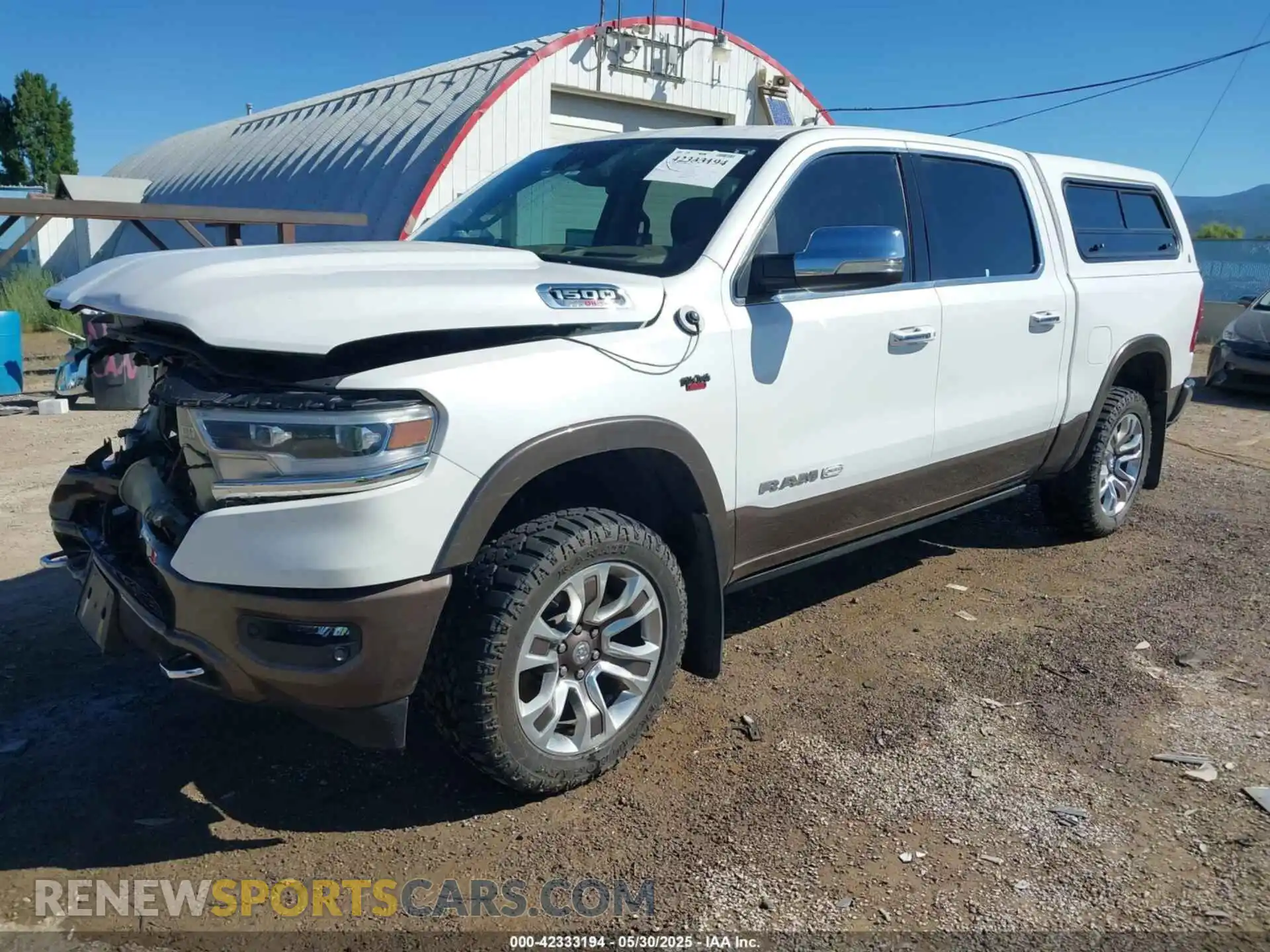 2 Photograph of a damaged car 1C6SRFKM7MN748441 RAM 1500 2021
