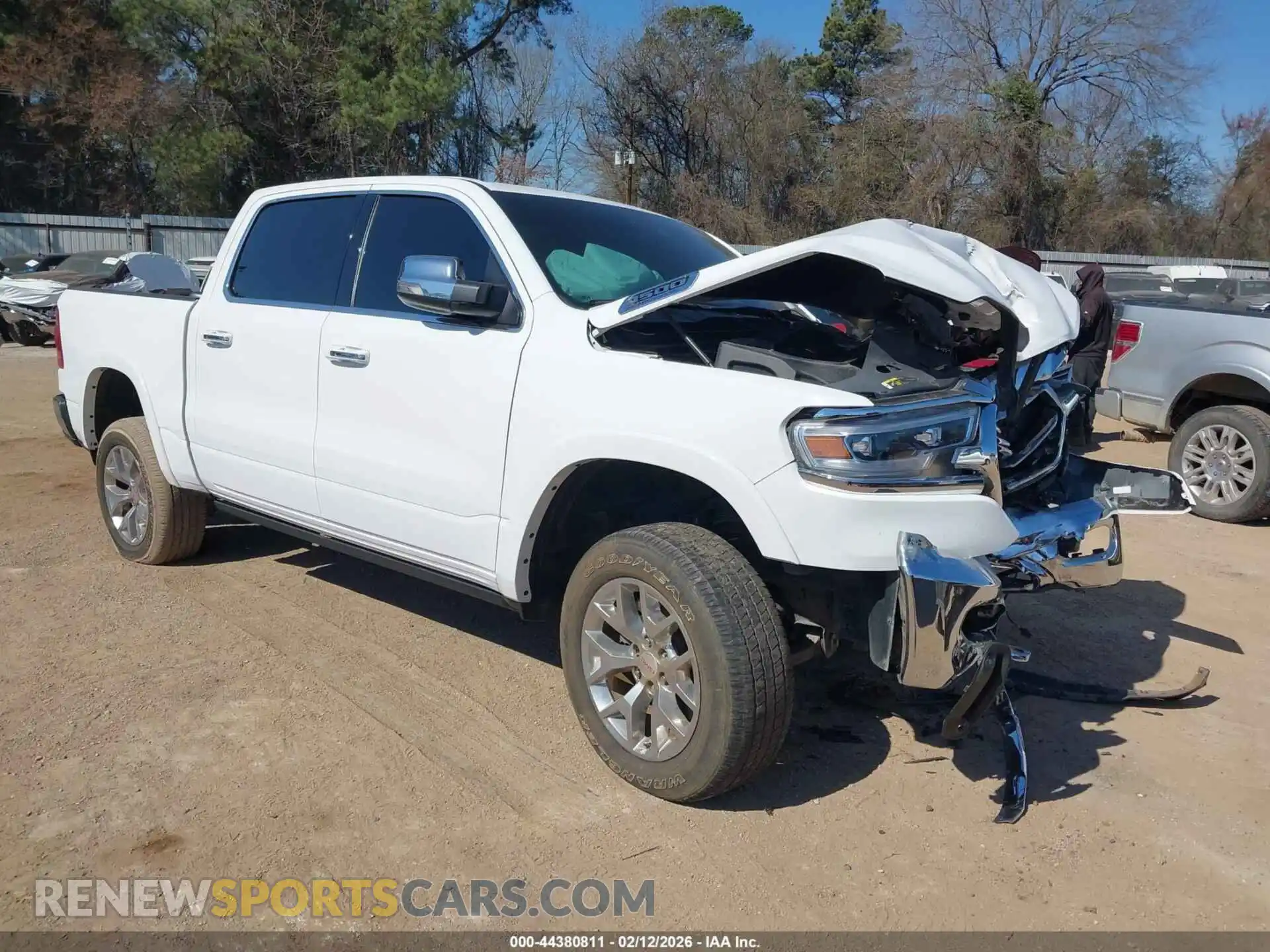 1 Photograph of a damaged car 1C6SRFKT0MN811970 RAM 1500 2021