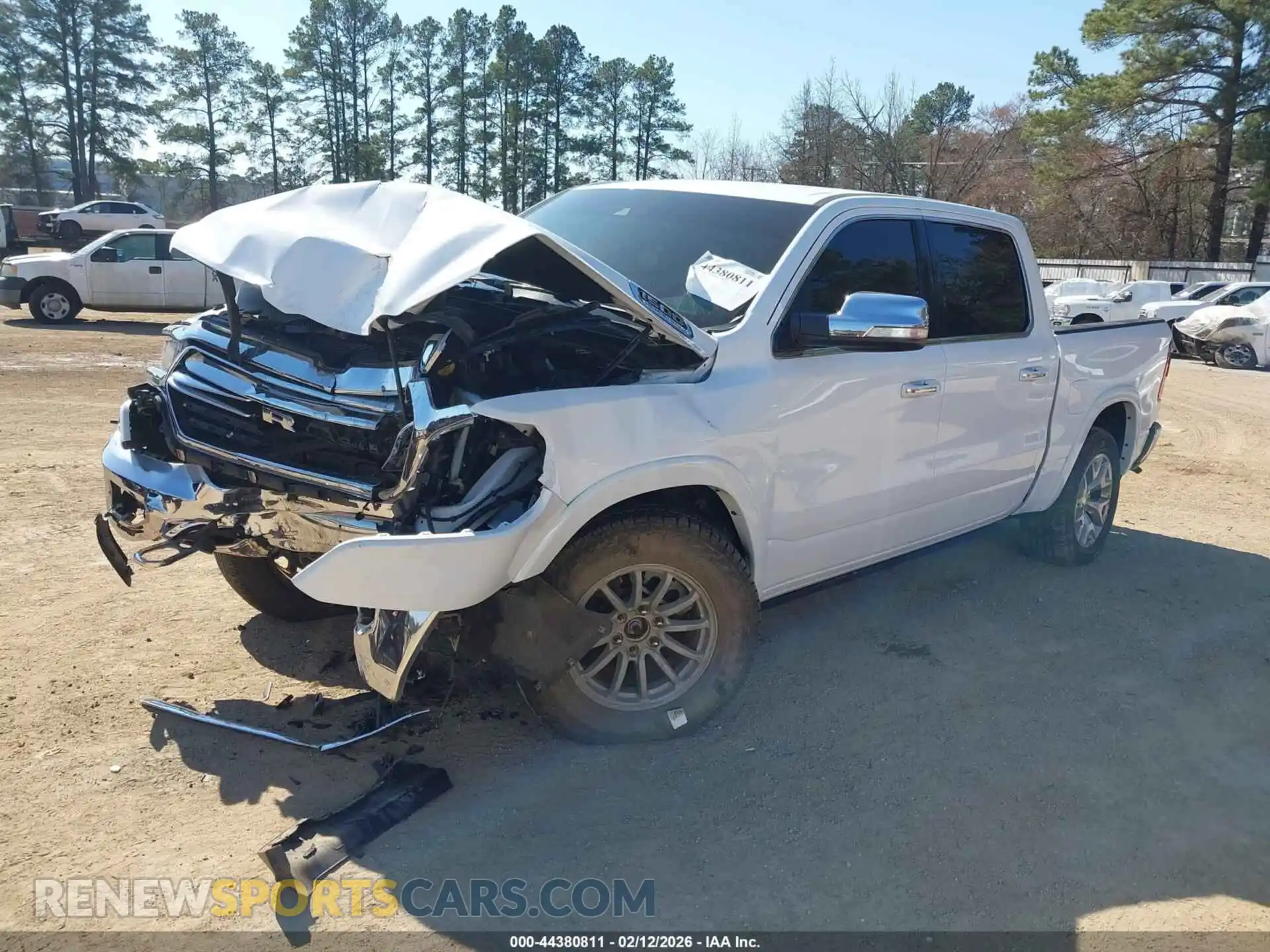 2 Photograph of a damaged car 1C6SRFKT0MN811970 RAM 1500 2021
