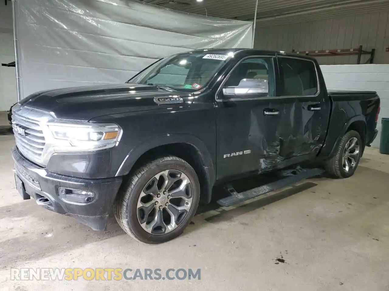 1 Photograph of a damaged car 1C6SRFKT1MN505702 RAM 1500 2021
