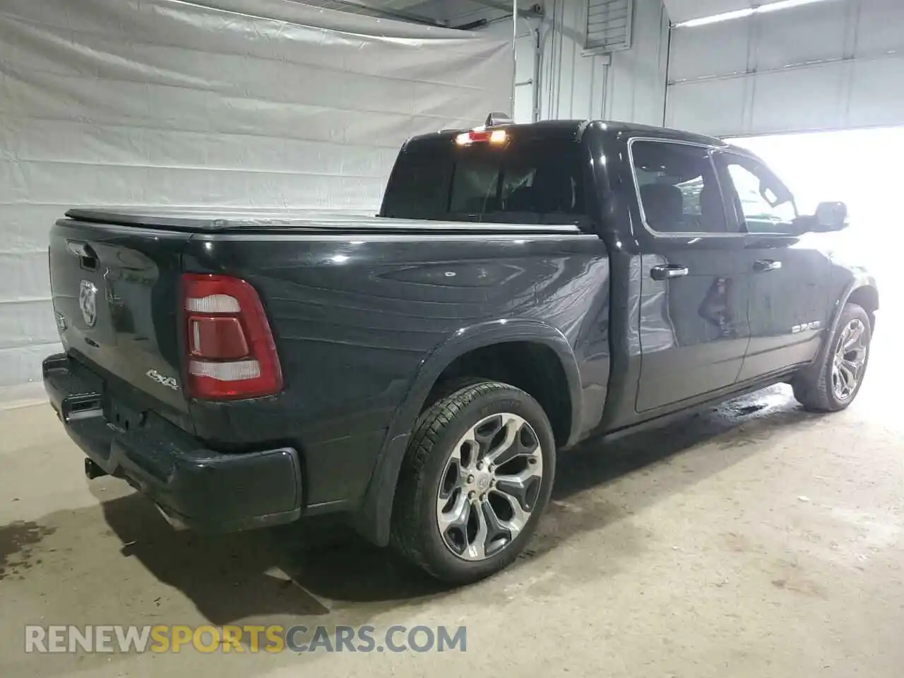 3 Photograph of a damaged car 1C6SRFKT1MN505702 RAM 1500 2021