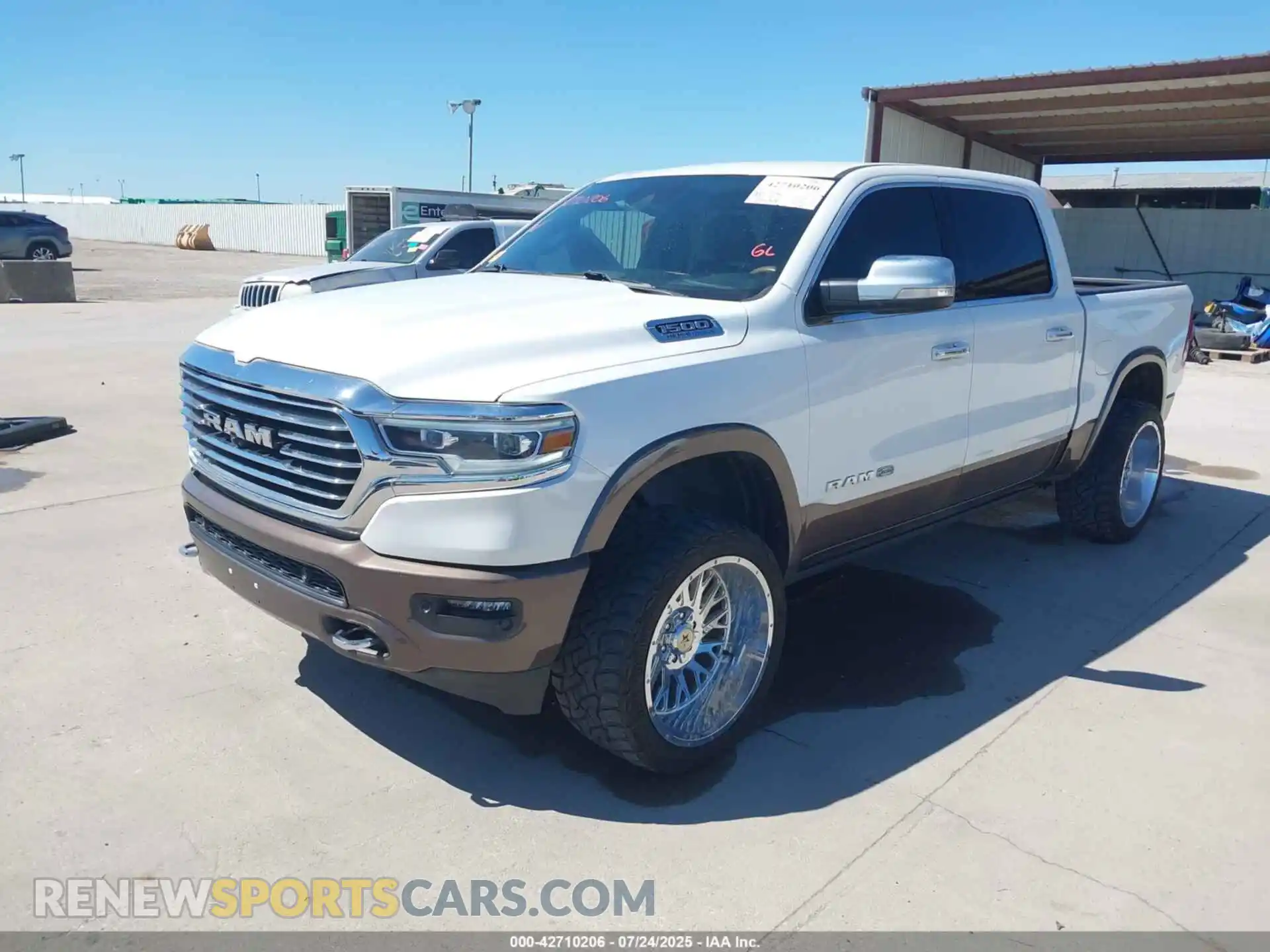 2 Photograph of a damaged car 1C6SRFKT6MN534368 RAM 1500 2021