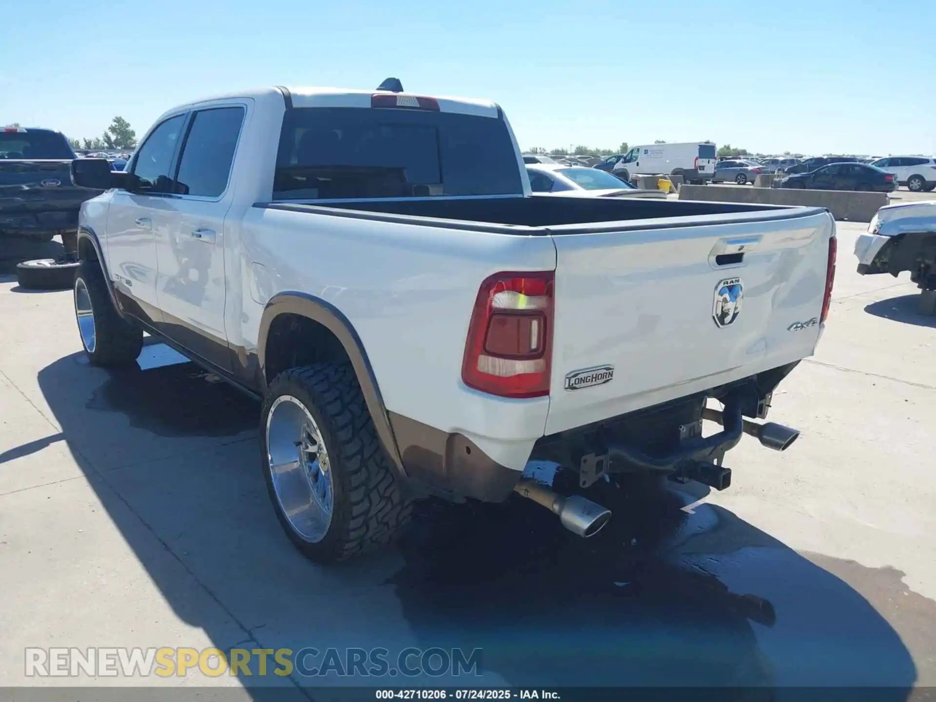 3 Photograph of a damaged car 1C6SRFKT6MN534368 RAM 1500 2021