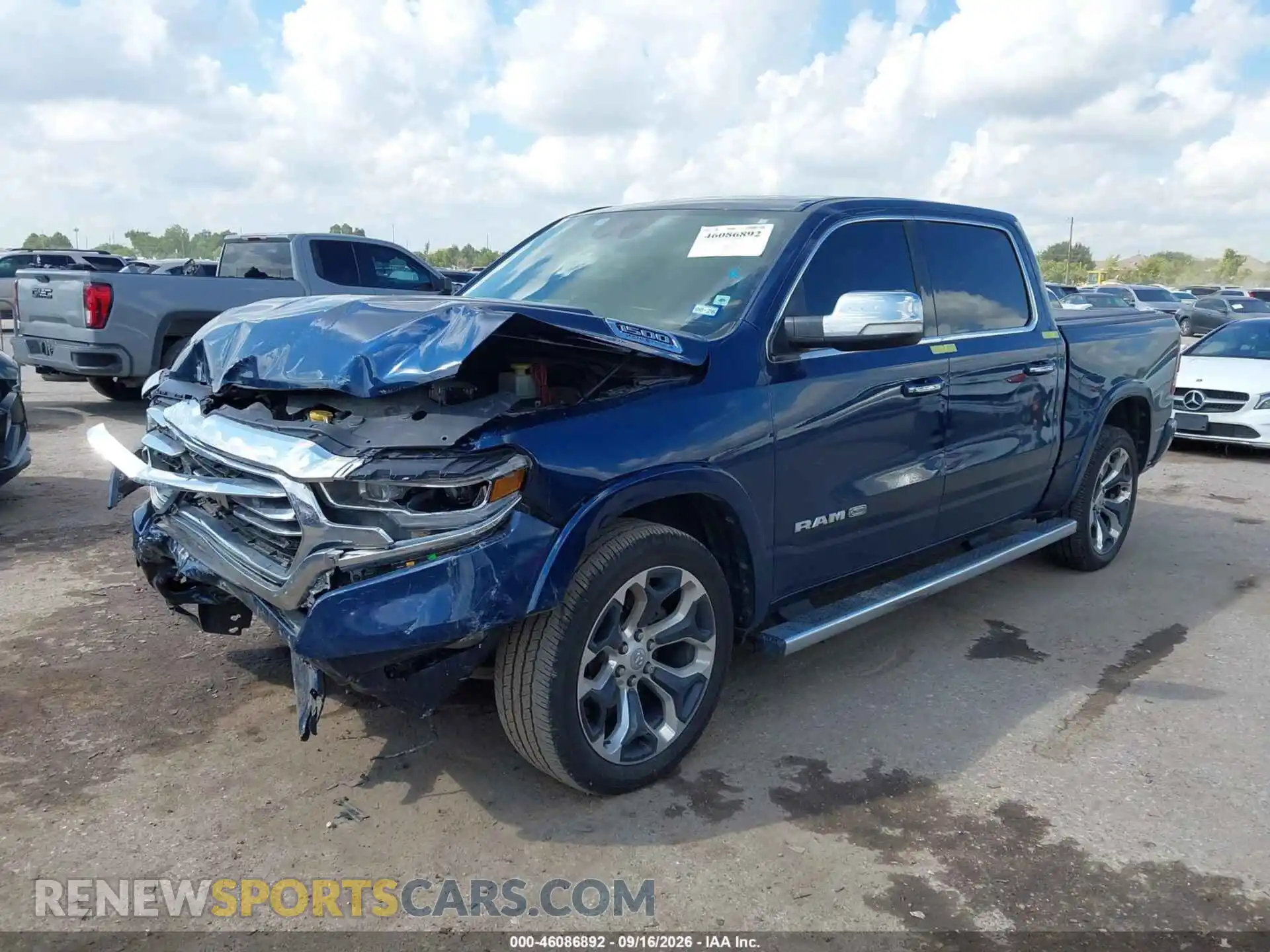 2 Photograph of a damaged car 1C6SRFKT6MN823508 RAM 1500 2021