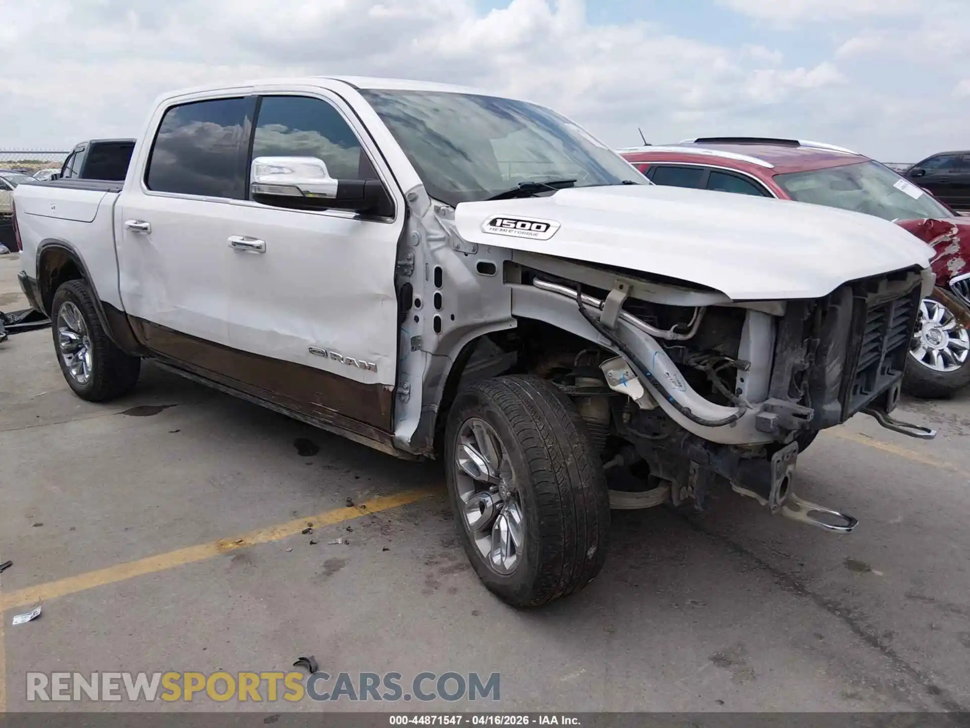 1 Photograph of a damaged car 1C6SRFKT7MN525663 RAM 1500 2021