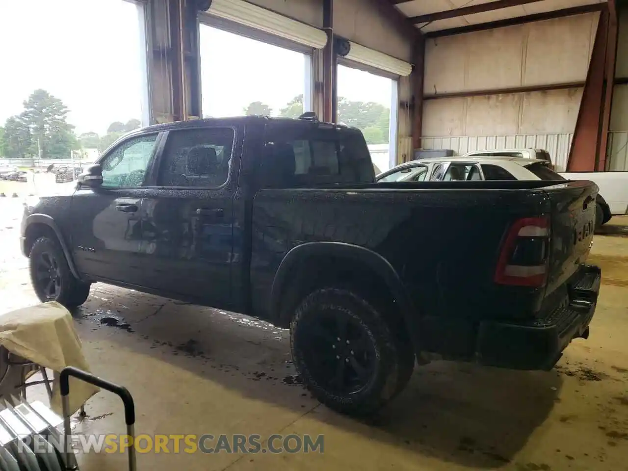 2 Photograph of a damaged car 1C6SRFLM0MN746027 RAM 1500 2021