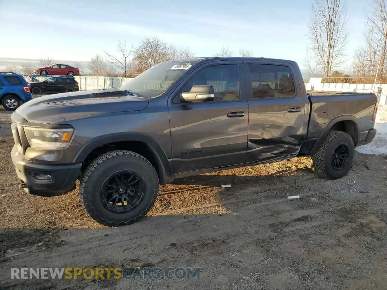 1 Photograph of a damaged car 1C6SRFLM1MN614751 RAM 1500 2021