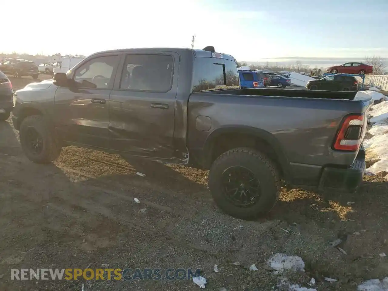 2 Photograph of a damaged car 1C6SRFLM1MN614751 RAM 1500 2021