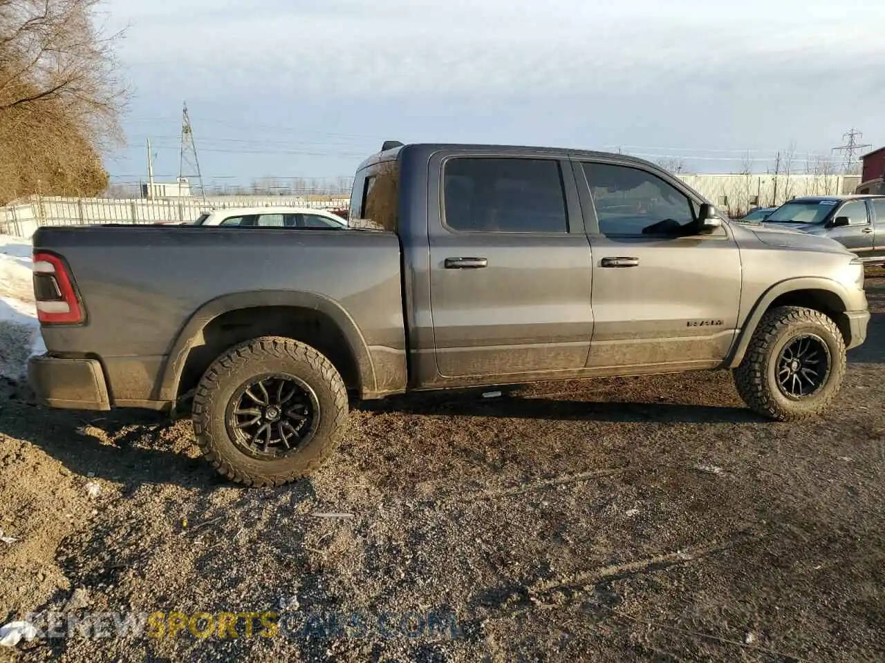 3 Photograph of a damaged car 1C6SRFLM1MN614751 RAM 1500 2021