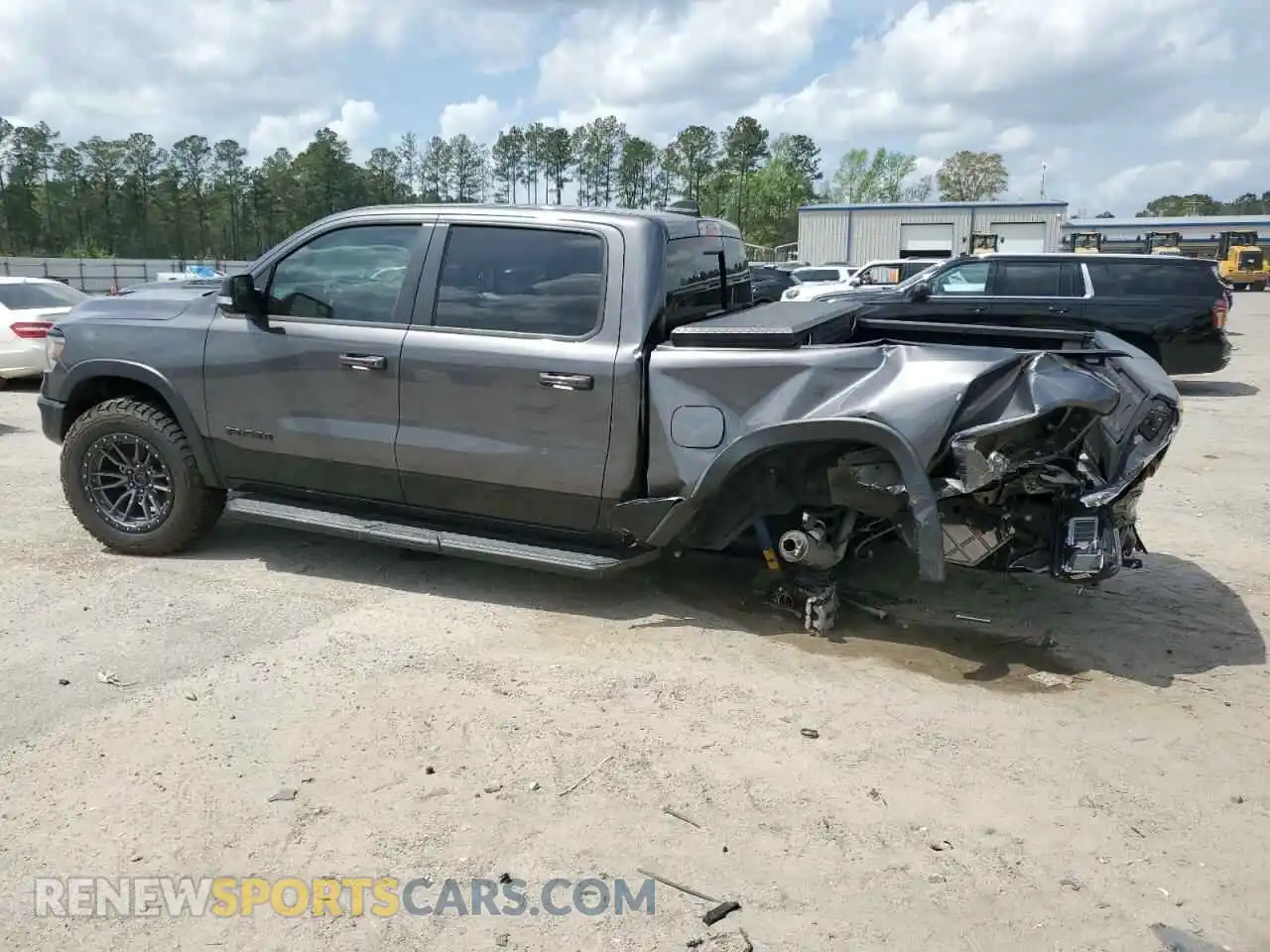 2 Photograph of a damaged car 1C6SRFLT0MN559961 RAM 1500 2021
