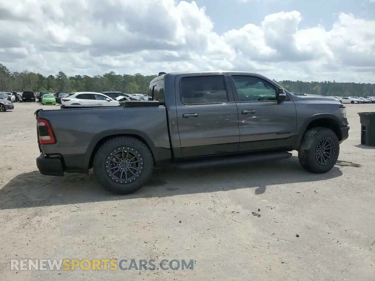 3 Photograph of a damaged car 1C6SRFLT0MN559961 RAM 1500 2021