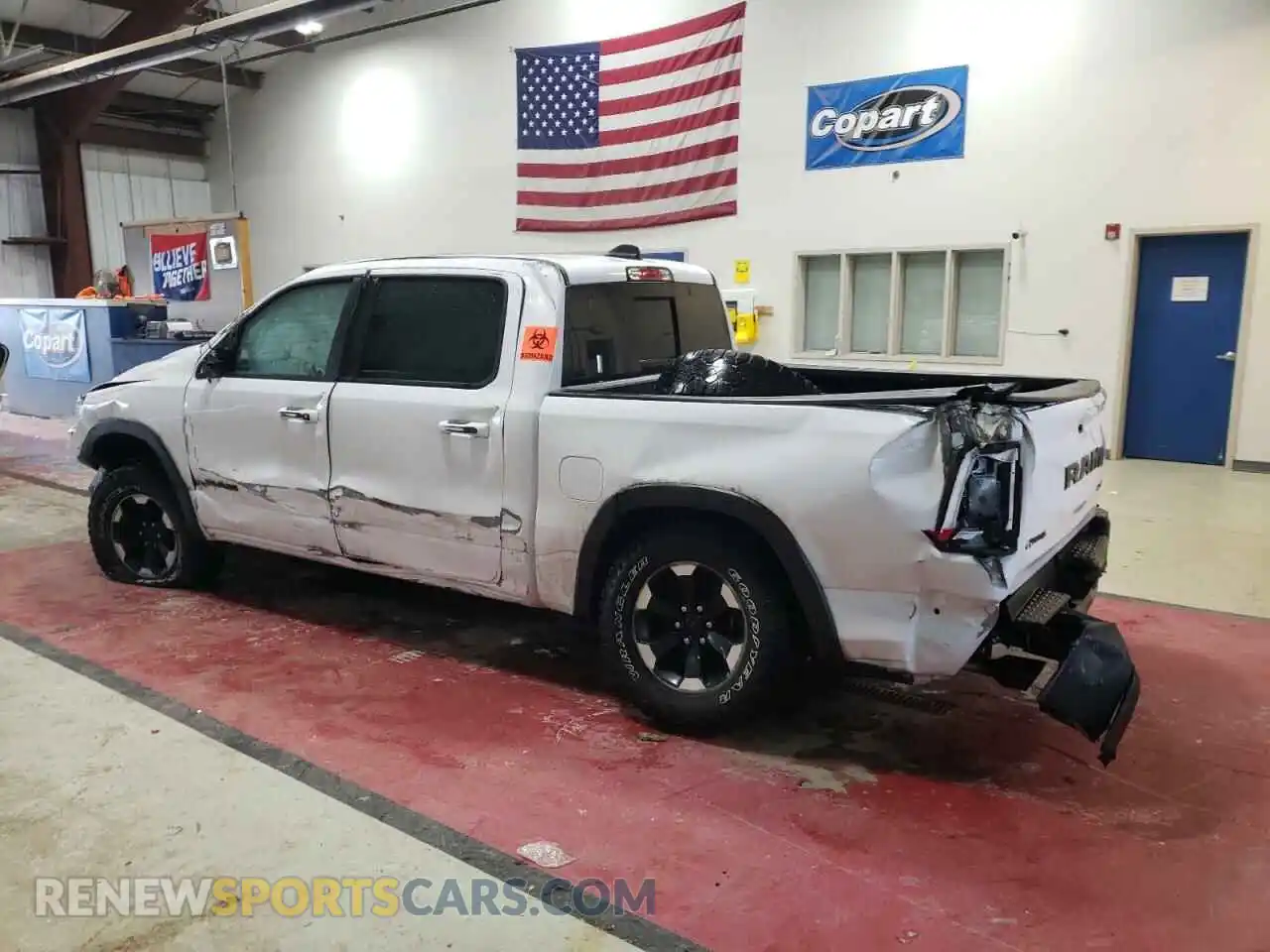 2 Photograph of a damaged car 1C6SRFLT2MN782406 RAM 1500 2021