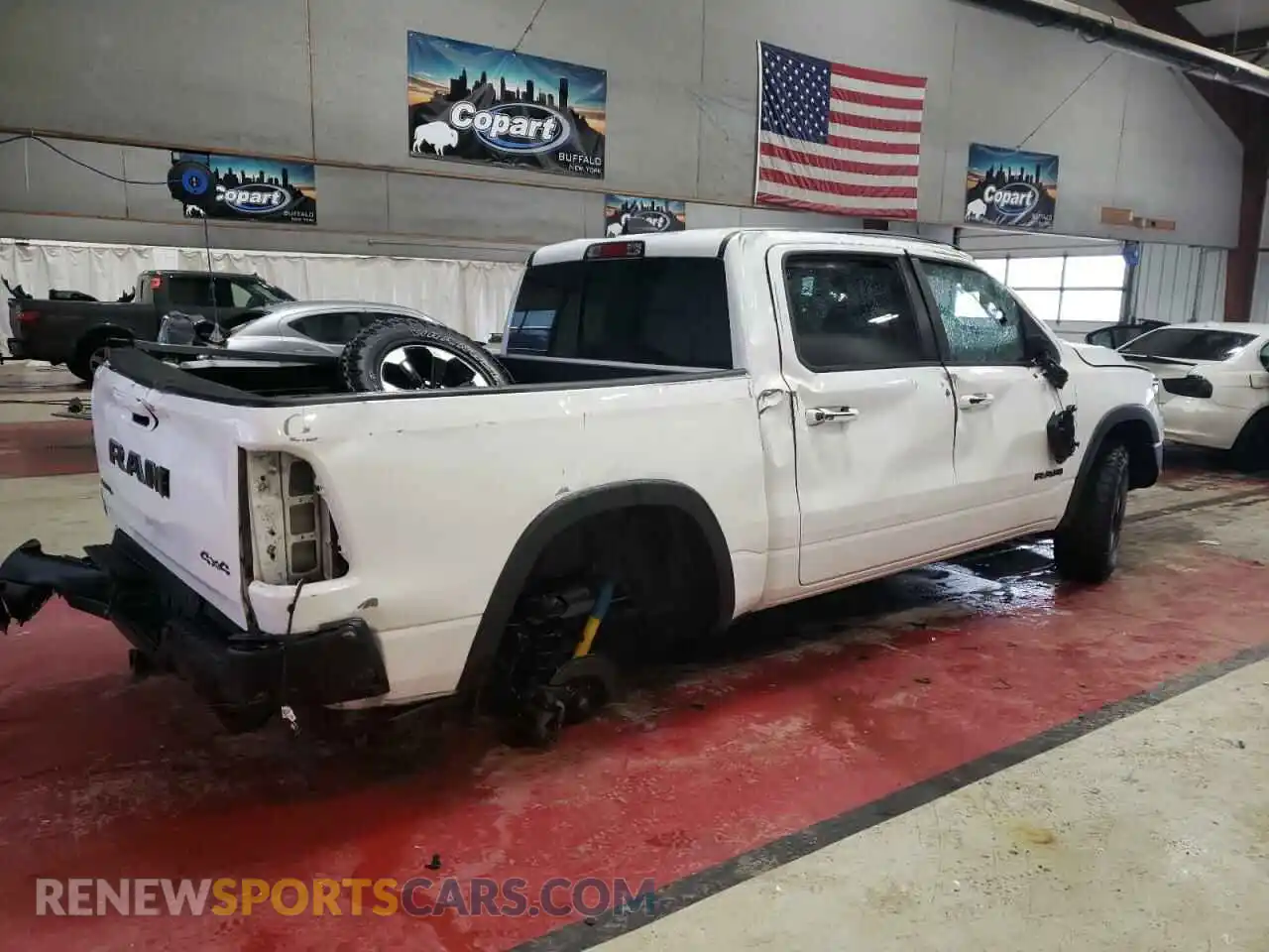 3 Photograph of a damaged car 1C6SRFLT2MN782406 RAM 1500 2021