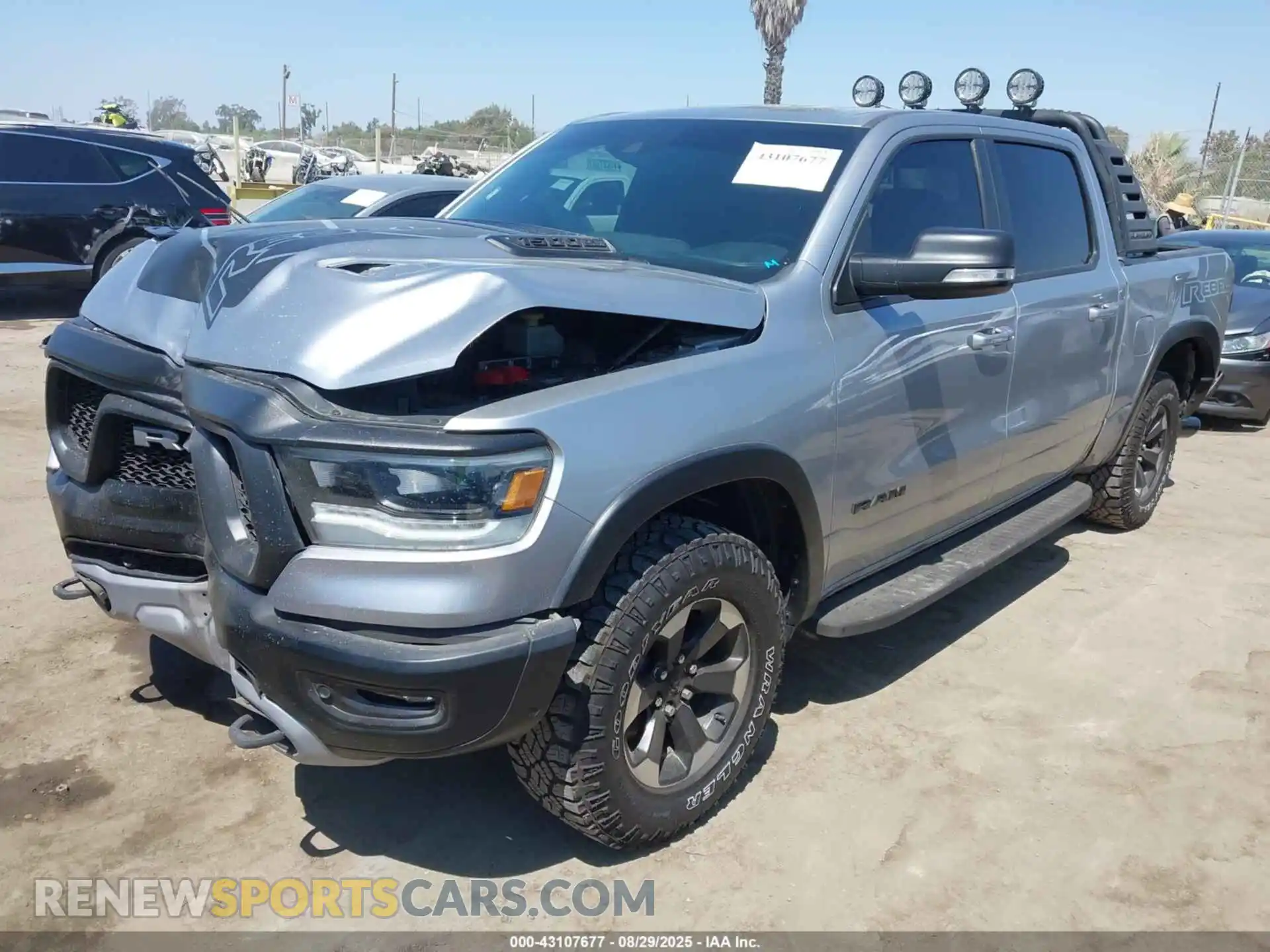 2 Photograph of a damaged car 1C6SRFLT2MN814299 RAM 1500 2021