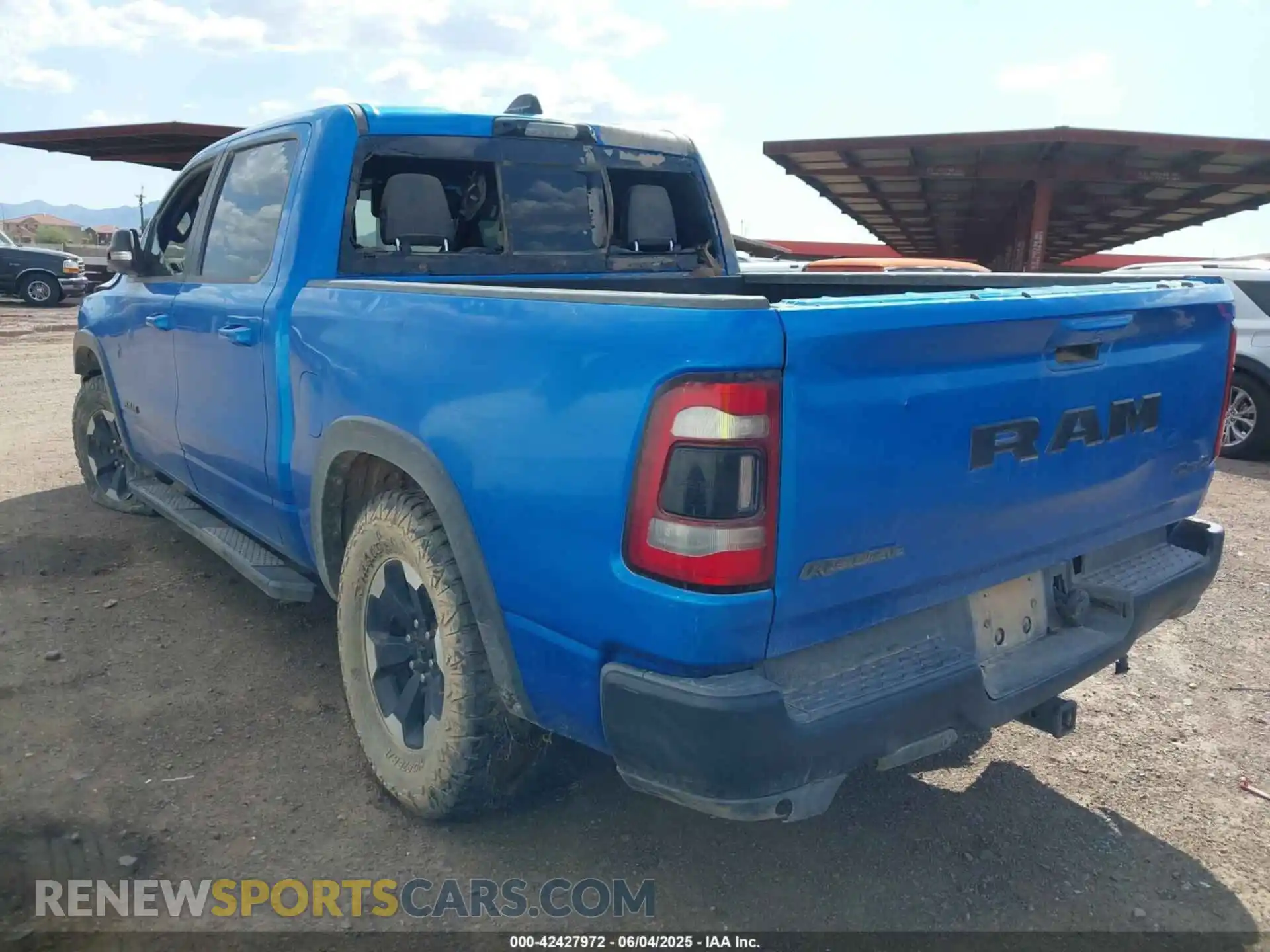 3 Photograph of a damaged car 1C6SRFLT3MN573143 RAM 1500 2021