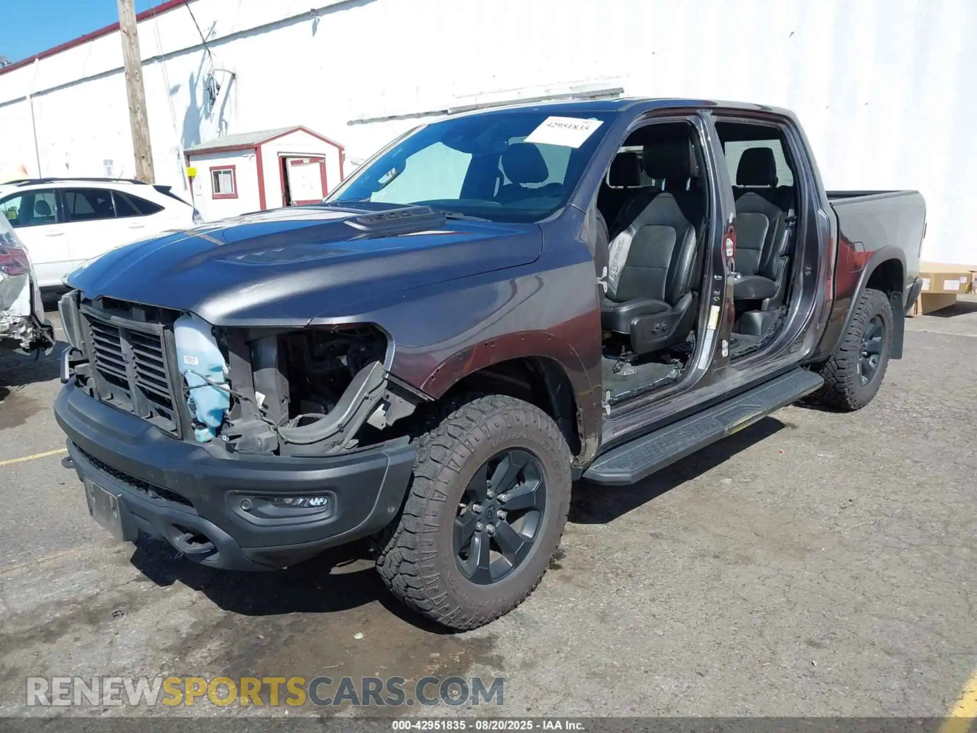 2 Photograph of a damaged car 1C6SRFLT3MN684548 RAM 1500 2021