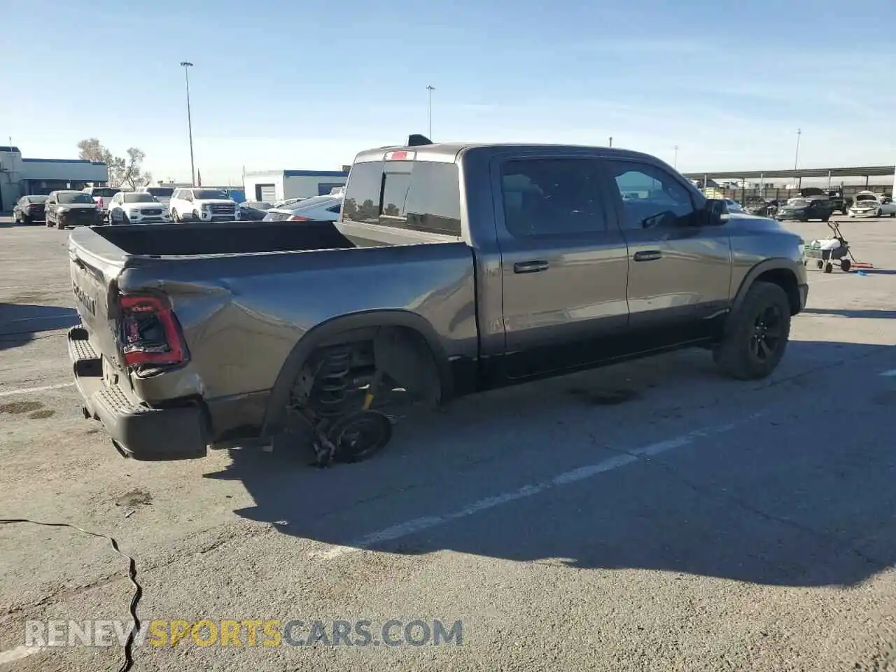 3 Photograph of a damaged car 1C6SRFLT4MN563379 RAM 1500 2021