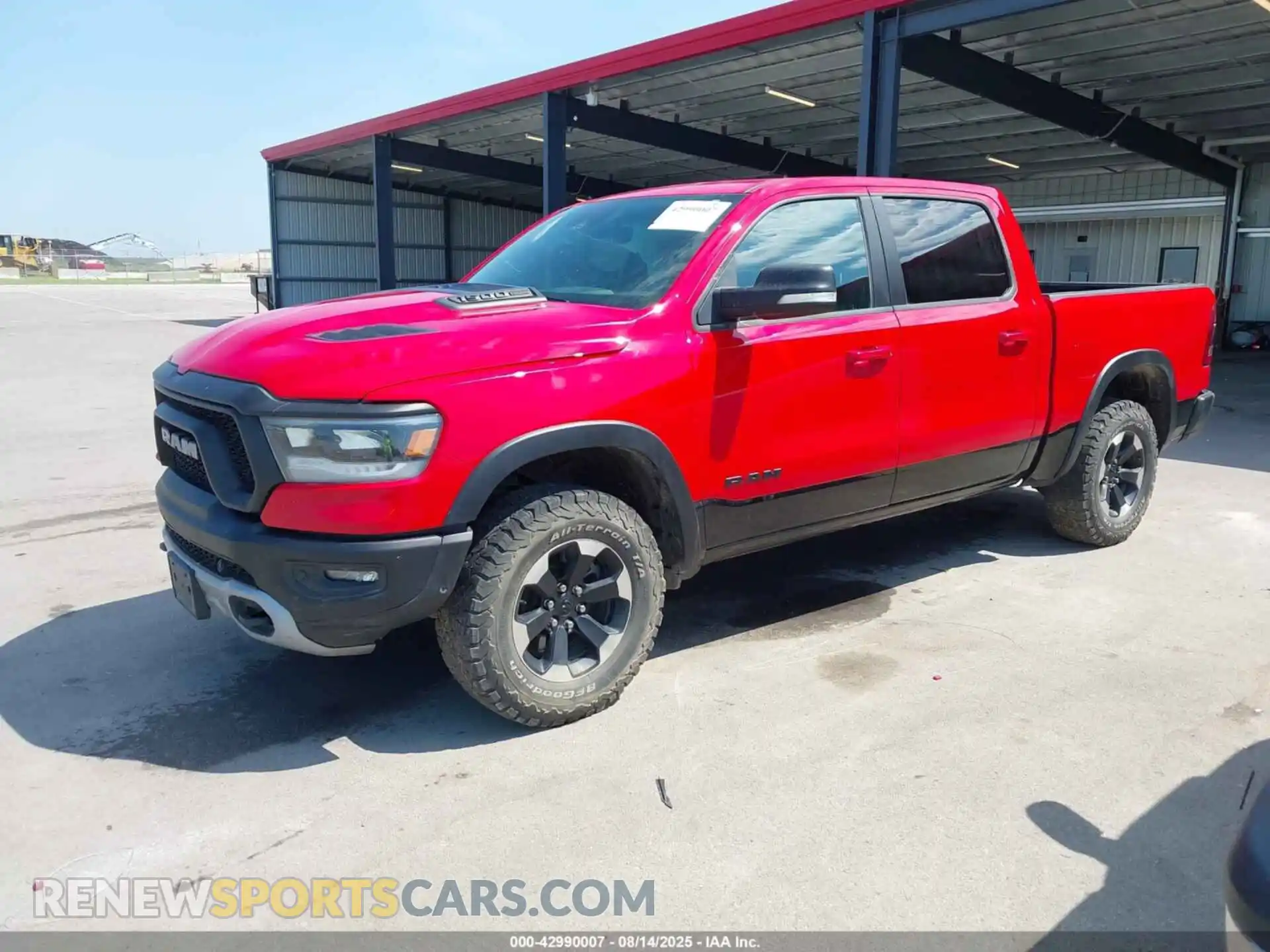 2 Photograph of a damaged car 1C6SRFLT4MN604657 RAM 1500 2021